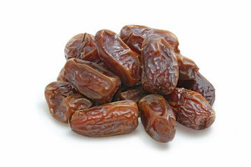 Heap of dried tasty dates with half isolated on white