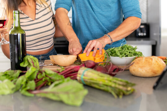 Close Up of Couple Making Dinner
