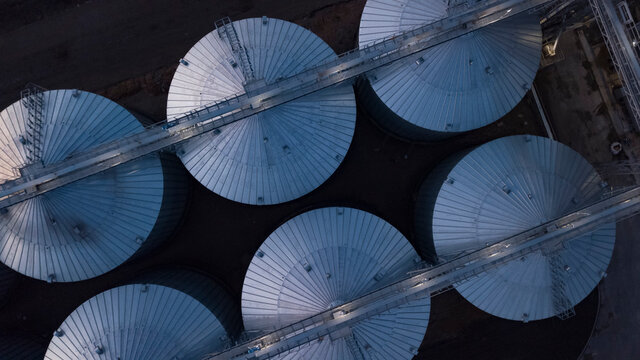 Rows of grain storage tanks