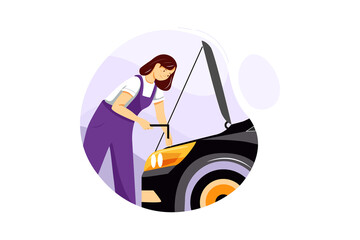 Female mechanic in white shirt and coverall repairing engine