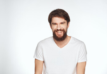 Man with beard fashionable hairstyle model cropped view of white t-shirt