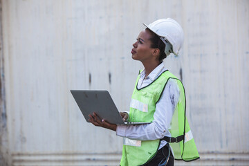 workers checking Containers box from Cargo freight ship on computer for import export. cargo container ship concept. Container Shipping Logistics Engineering of Import Export Transportation Industry