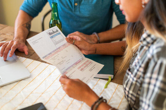 Couple Looks Over Bill Statement Together