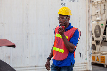 Engineer woman African prepare export products. Container Shipping Logistics Engineering of Import...