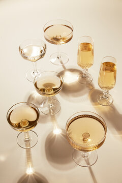 Several Glasses of Champagne on Gold