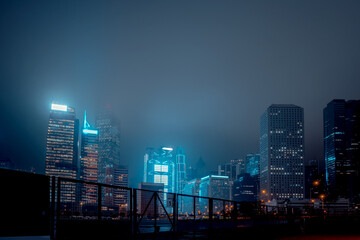 Modern office buildings in Hong Kong at foggy night