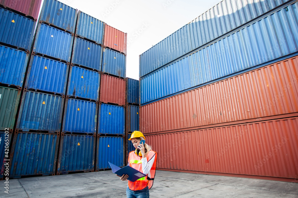 Poster foreman control loading containers box from cargo freight ship. business logistic concept, import an