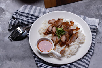 Steamed rice, grilled pork neck with spicy sauce