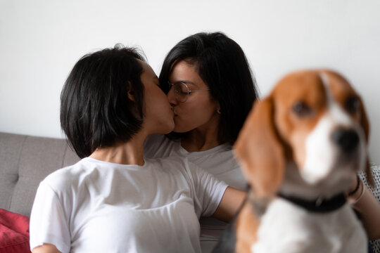 Lesbian couple with their pet