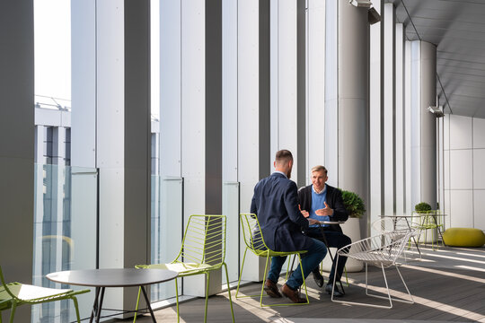 Businessmen Meeting At Modern Office Terrace