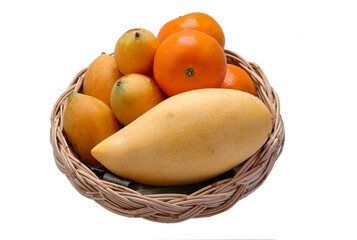Mango, Orange and Sweet Yellow Marian Plum in a wicker basket on a white background.