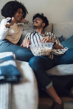 Couple Watching Television at Home