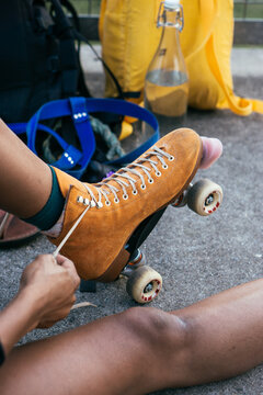 Close up view of an orange roller skates.