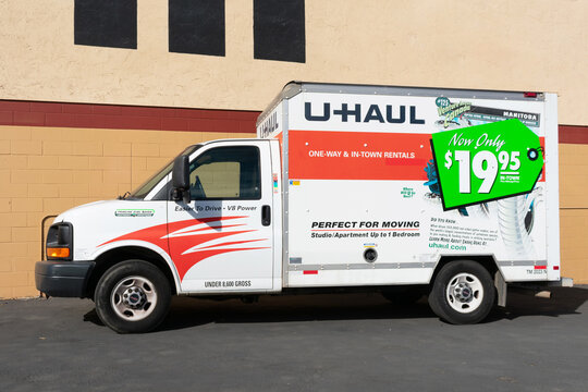 Side view of parked U-Haul 10 foot moving truck. U-Haul is an American moving equipment and storage rental company. - San Diego, California, USA - 2020