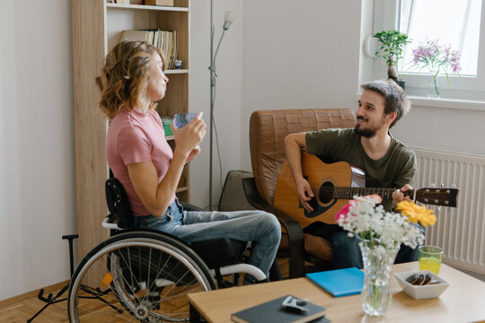 Young couple in love spending their free time together at home