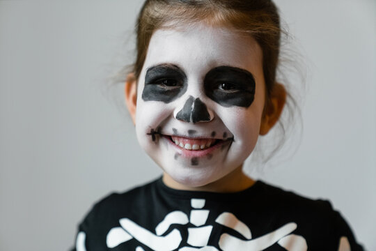 Happy little skeleton smiling for camera