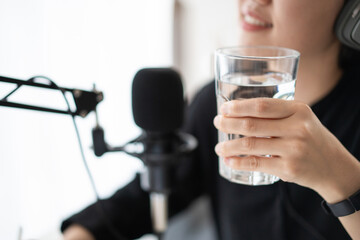 Woman making a home podcast.