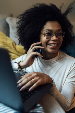 Young Smiling Woman Working from Home