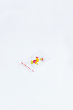 Pills / candy in transparent plastic bag