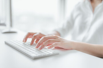 modern businesswomanTyping on the keyboard