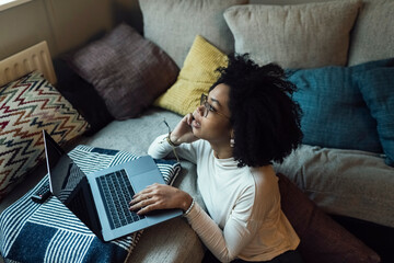 Young Smiling Woman Working from Home