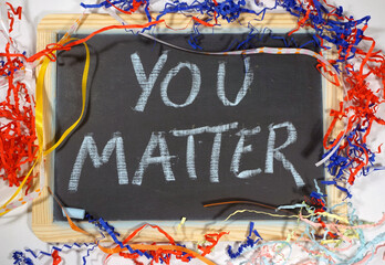 You matter celebration message on chalkboard