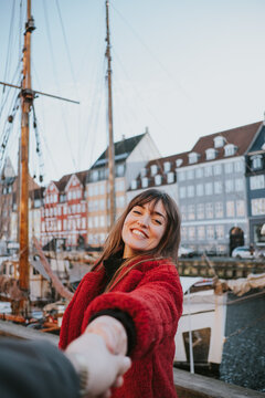 Portrait of woman playing tourist in copenhagen