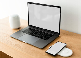 Laptop with blank screen on a wooden table