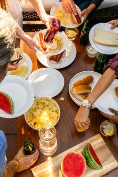 People Plate Food At A BBQ