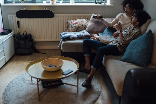 Couple Watching Television at Home