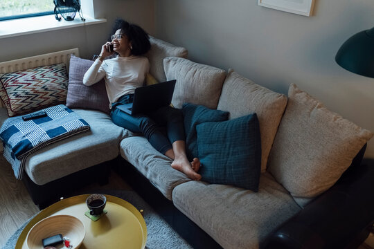 Young Smiling Woman Working from Home