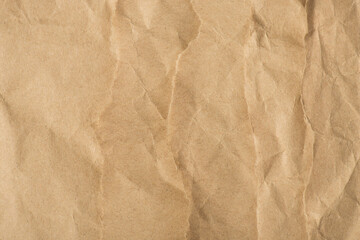 Obraz premium Top view photo of isolated crumpled craft paper background with copyspace