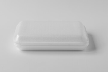  New white foam box for food on natural background.