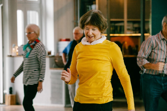 Old Lady Enjoying Herself During Dance Class