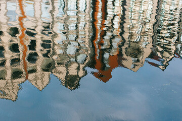 Houses Reflected In A Canal