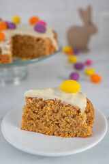 Traditional carrot cake with cream cheese frosting for Easter