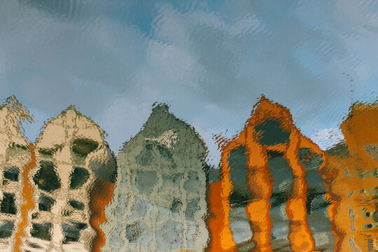 Houses Reflected In A Canal