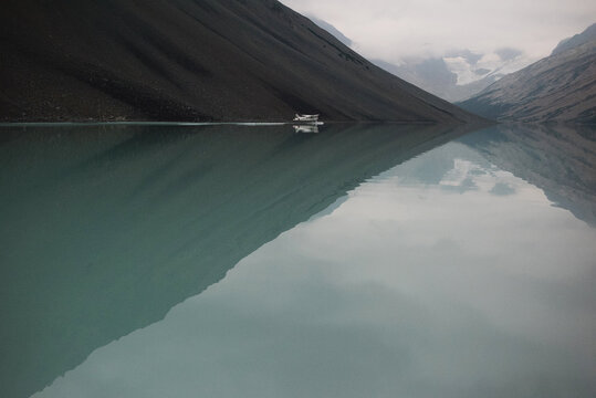 Float plane on alpine lake