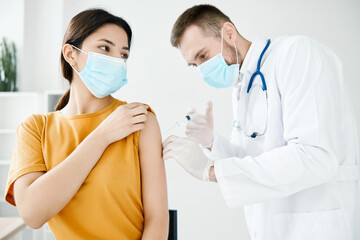 Fototapeta premium patient came to hospital for covid-19 vaccination and medical mask