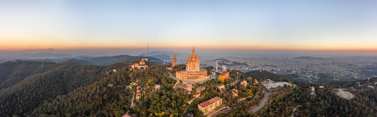 Obraz premium Aerial panorama drone view of Sacred Heart Basilica on top of Tibidabo near Barcelona during sunset in Spain winter