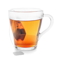 Cup of aromatic black tea on white background