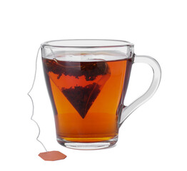 Cup of aromatic black tea on white background