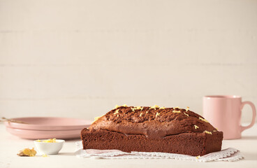 Tasty gingerbread cake on light background