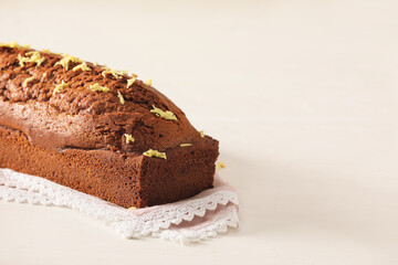 Tasty gingerbread cake on light background