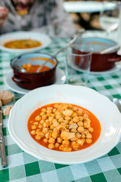 Close up of chickpeas with codfish served on plate