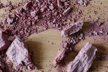 Detail of pink clay powder from a sculpture