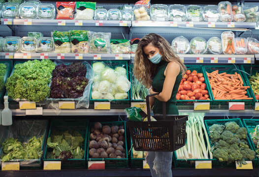Young Woman Buying Groceries in the Supermarket