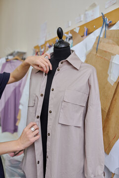 business woman fashion designer at her in her clothing manufacturing office