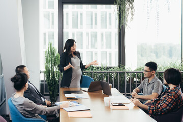 Asian people working in office