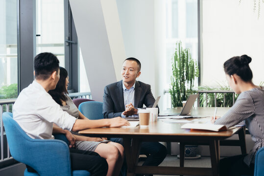 Asian people working in office